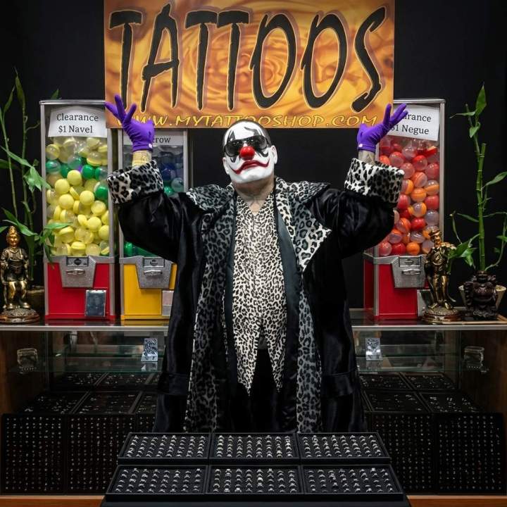 A person wearing a clown costume at My Tattoo Shop Hollywood